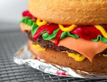 A hamburger made from cake and frosting