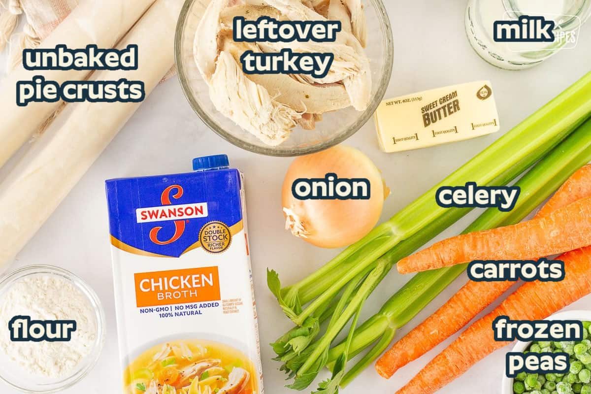 This Turkey Pot Pie is one of our favorite ways to use Thanksgiving leftovers. With its flaky crust loaded with turkey and vegetables, you'll want to make it a part of your family tradition too! Carrots, celery, turkey, milk, butter, peas, flour, chicken broth, onion and pie crusts for Easy Turkey Pot Pie.
