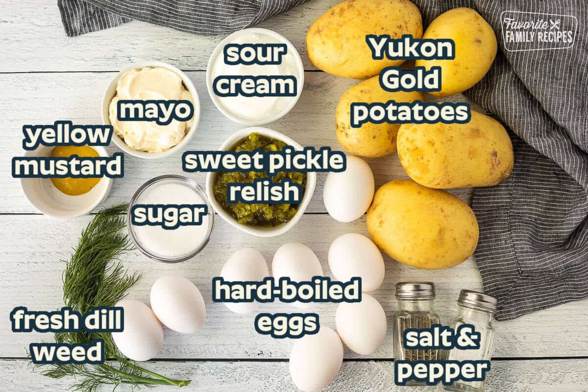 Ingredients to make Homemade Potato Salad including potatoes, sour cream, mayo, relish, salt, pepper, hard boiled eggs, sugar, mustard and dill.