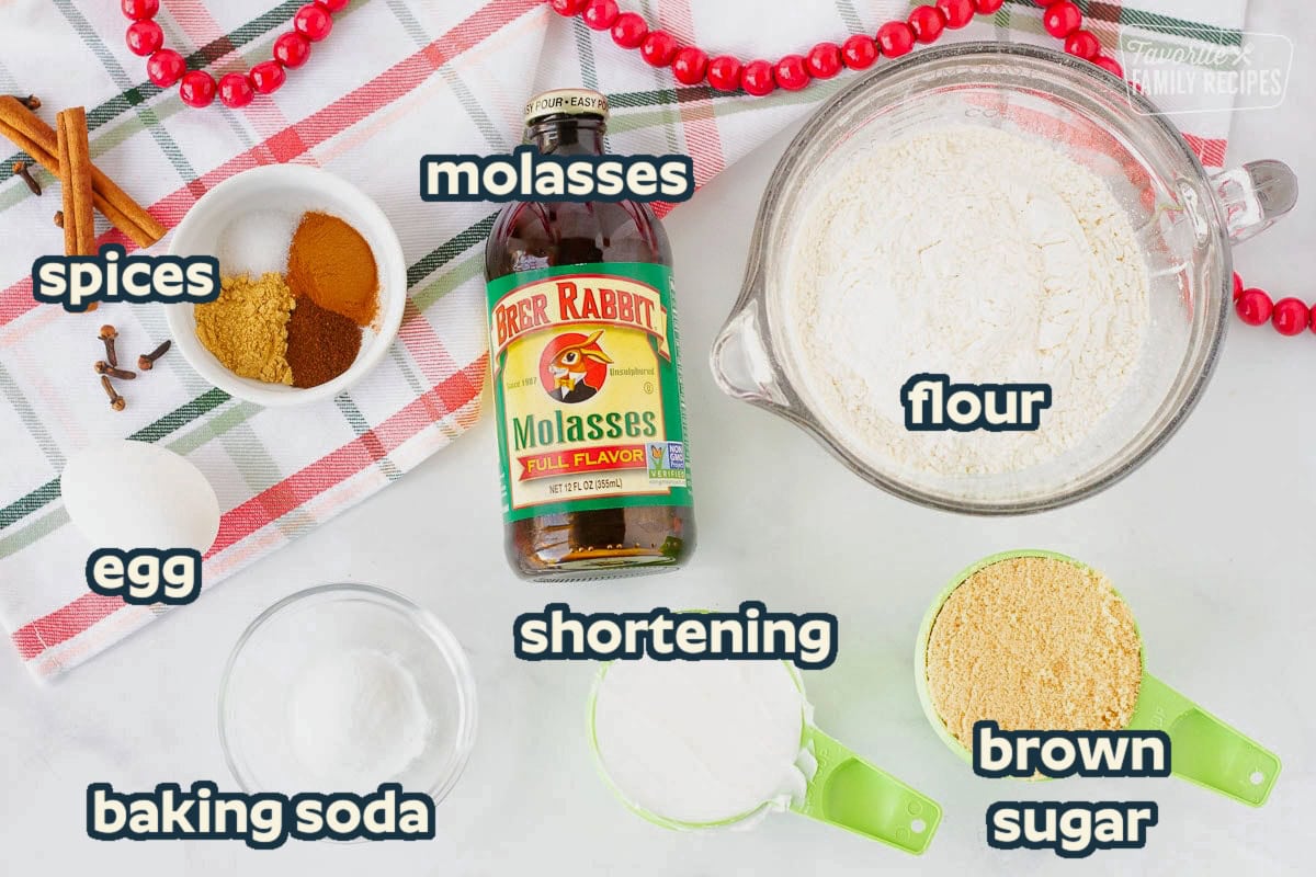 Molasses, spices, egg, crisco, brown sugar, salt and flour for molasses cookies.