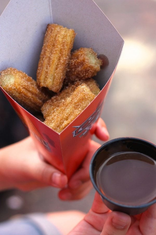 Disneyland Churro Bites with chocolate syrup on the side. 