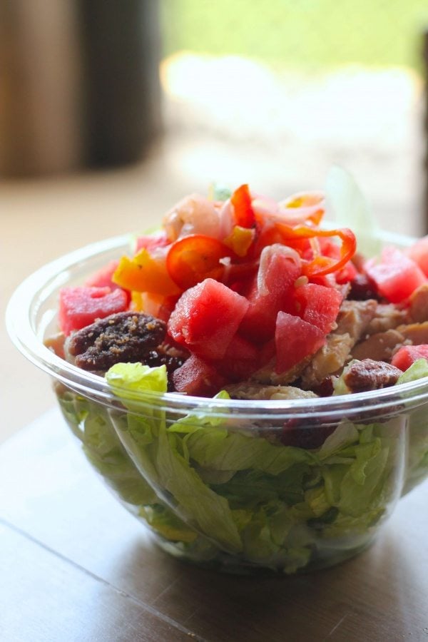 Chicken salad in a plastic bowl. 