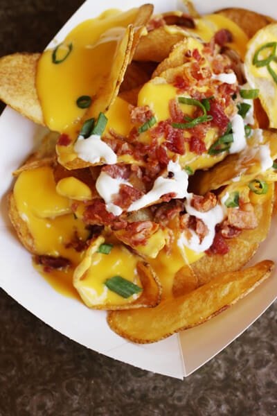 A visit to the Happiest Place on Earth wouldn't be complete without some of the most magical treats! From Dole Whip to Monte Cristos, check out our Favorite Foods at Disneyland. Tavern Nachos-Troubadour Tavern.