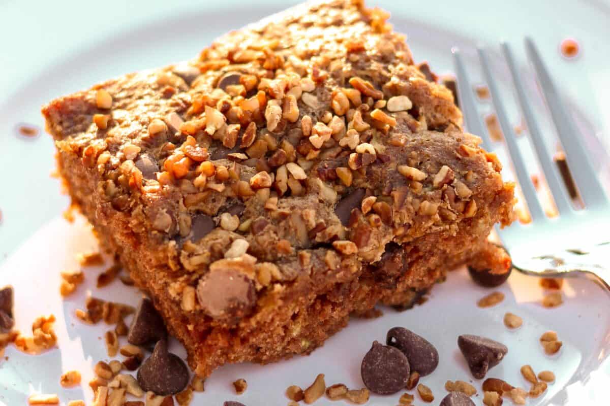 A slice of Picnic Cake on white plate.