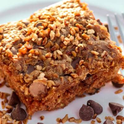 A slice of Picnic Cake on white plate.