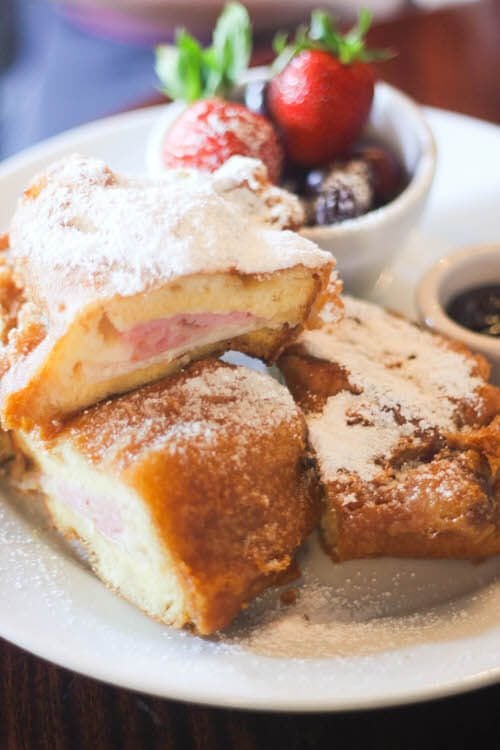 A visit to the Happiest Place on Earth wouldn't be complete without some of the most magical treats! From Dole Whip to Monte Cristos, check out our Favorite Foods at Disneyland. Disneyland Monte Cristos Cafe Orleans.
