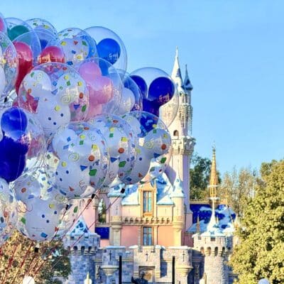 Disneyland Castle with Mickey Balloons