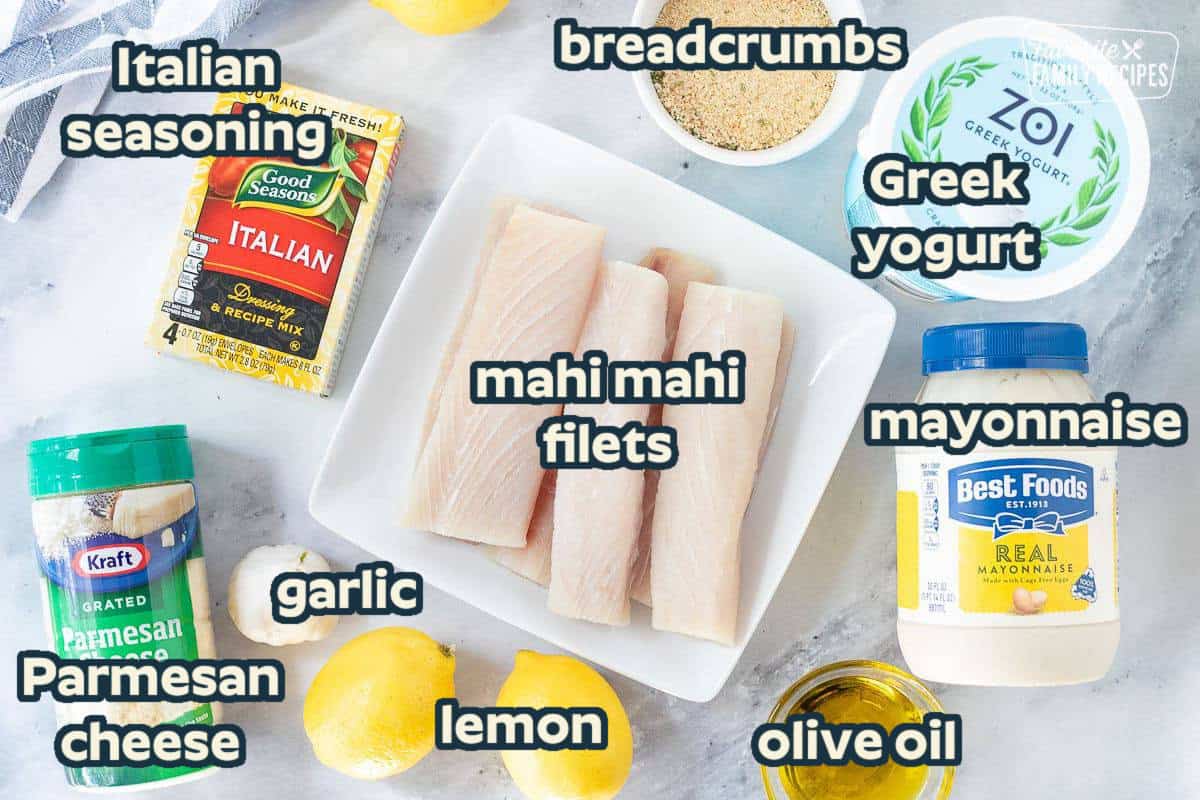 Ingredients to make Baked Mahi Mahi with Parmesan Crust including mahi mahi, Italian dressing seasoning, Italian bread crumbs, greek yogurt, mayonnaise, parmesan cheese, garlic, olive oil and lemons.