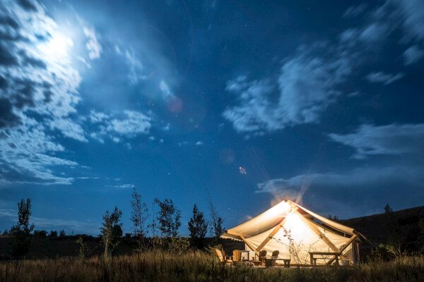 You can use it as a smoker. You can use it as a grill. You can use it for both. Glamping out in the woods.