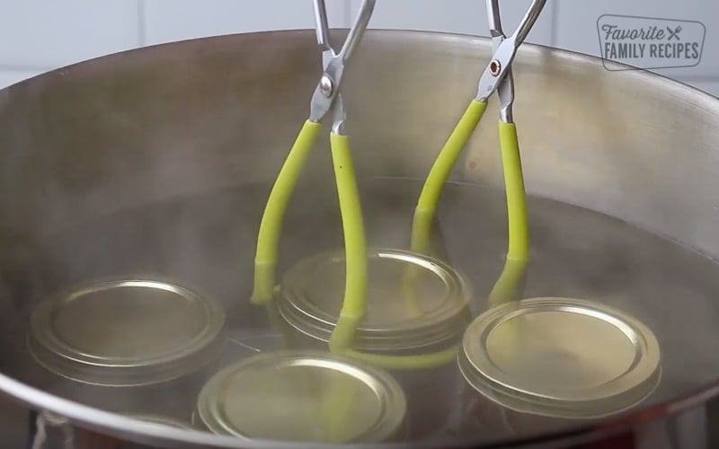 Pepper jelly jars in a water bath