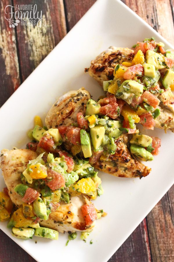 3 pieces of Citrus Avocado Chicken on a white tray from above.