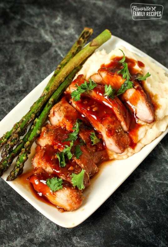 Plate with mashed potatoes and sliced pork tenderloin