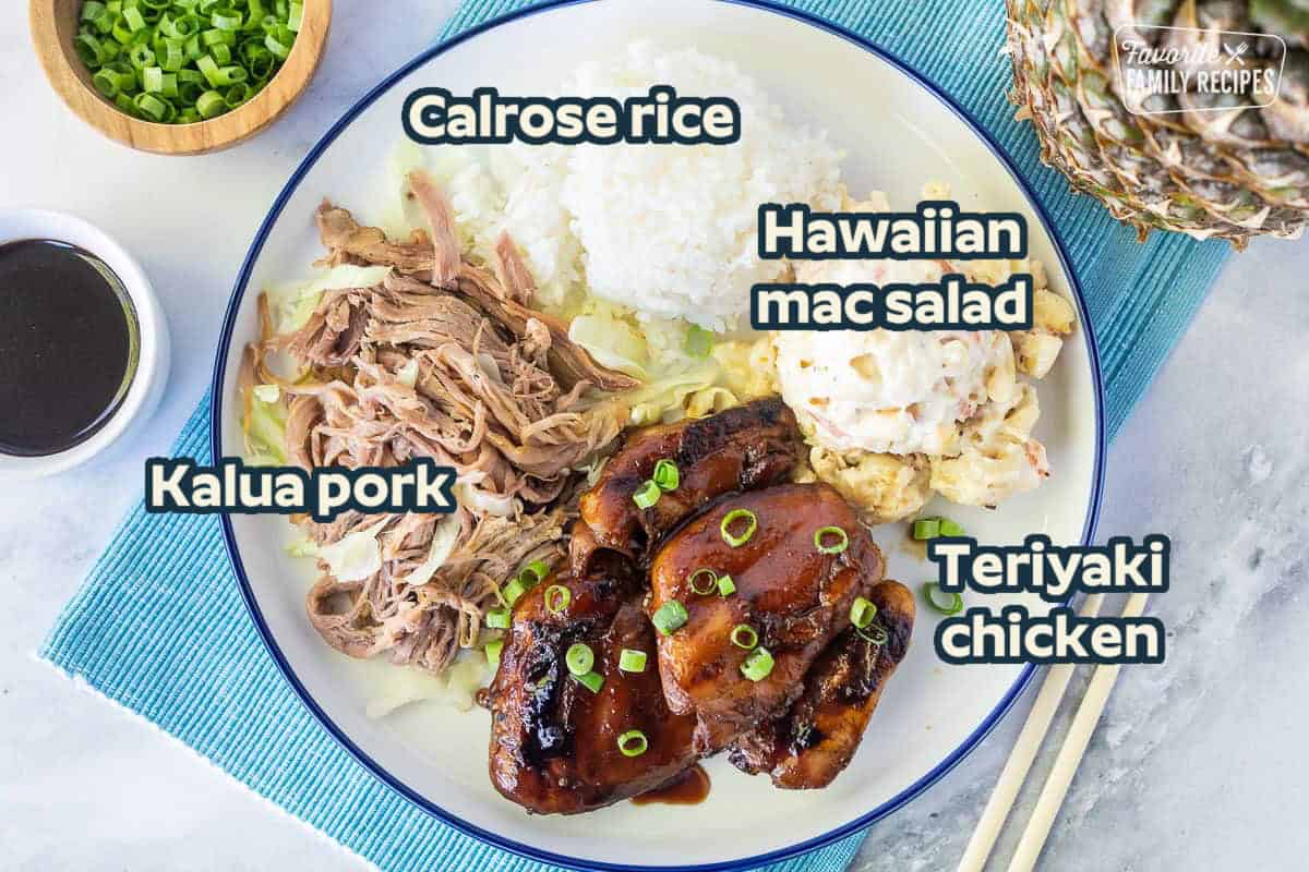 Hawaiian lunch plate with rice, Hawaiian Mac salad, Kalua pig, and Teriyaki Chicken
