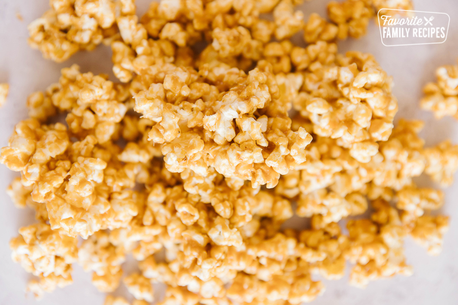 A bunch of peanut butter popcorn spread on a counter