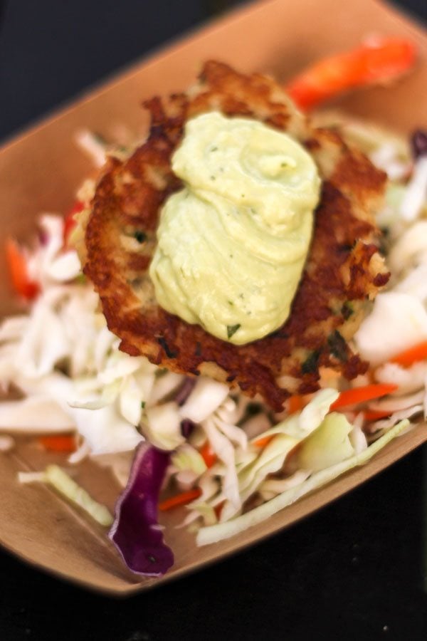 Lump crab cake with cabbage slaw and avocado lemongrass. 