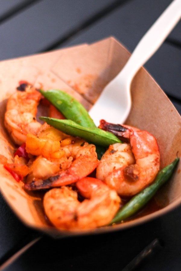 Spicy shrimp in a brown bowl. 