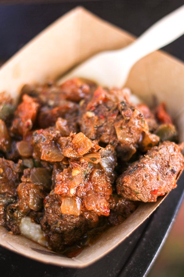 Beef tenderloin chunks in a cardboard bowl. 