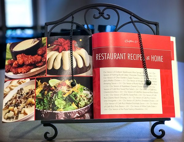 Cookbook paperback on a cookbook holder. 