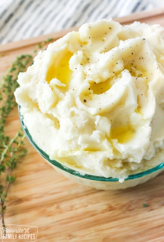 Mashed potatoes in a bowl with butter