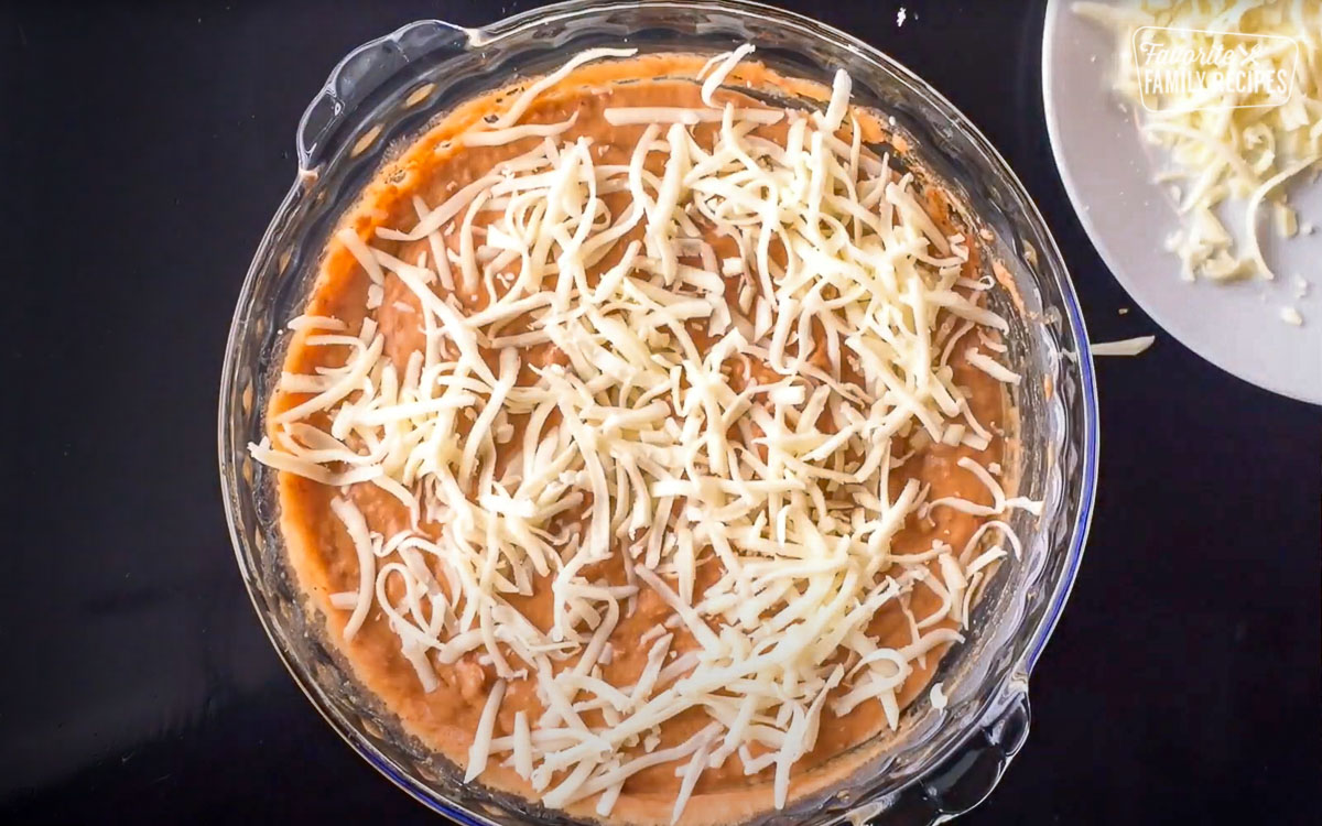 Adding cheese to refried beans