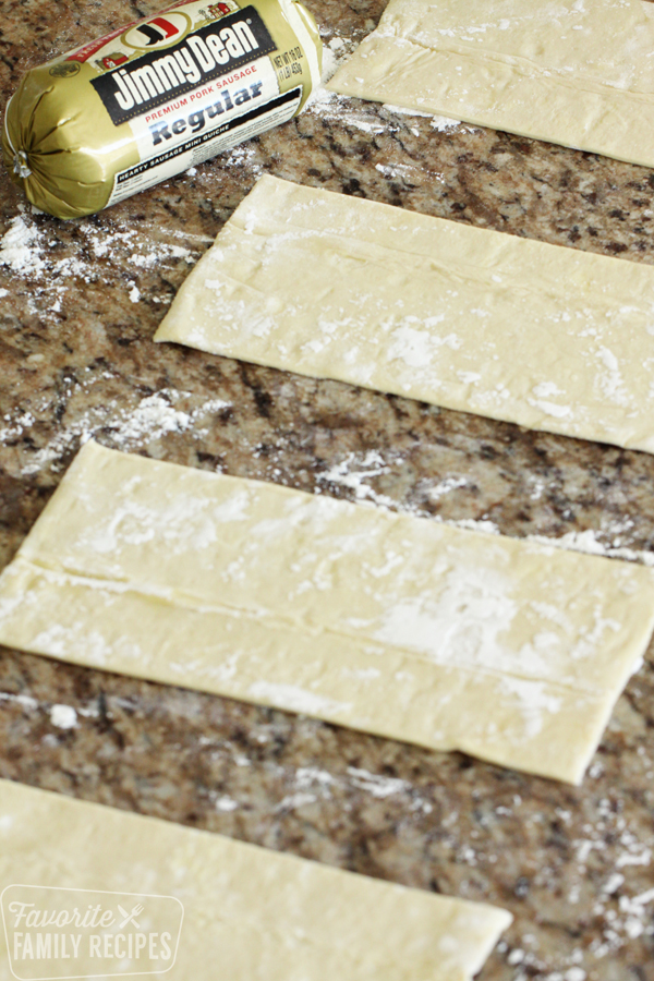 Pastry Puff Dough Rolled out and cut into strips for Australian Sausage Rolls