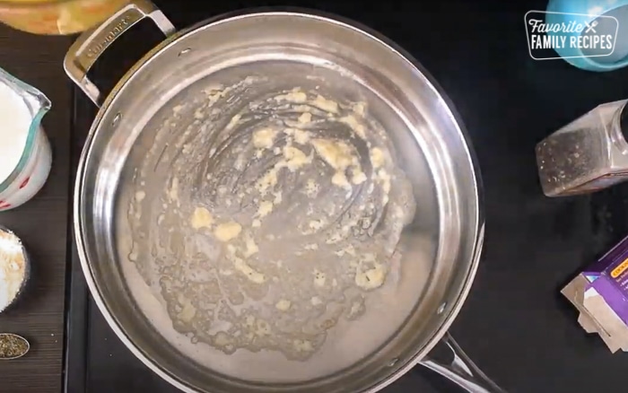 Butter and Garlic Simmering in a Fry Pan