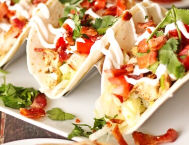 Grilled Chicken BLT Tacos on a white plate.