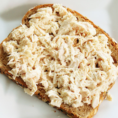 bread with tuna spread over the top