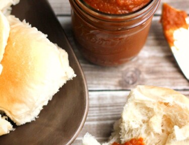 Maple Pumpkin Butter in a mason jar and spread onto a roll.
