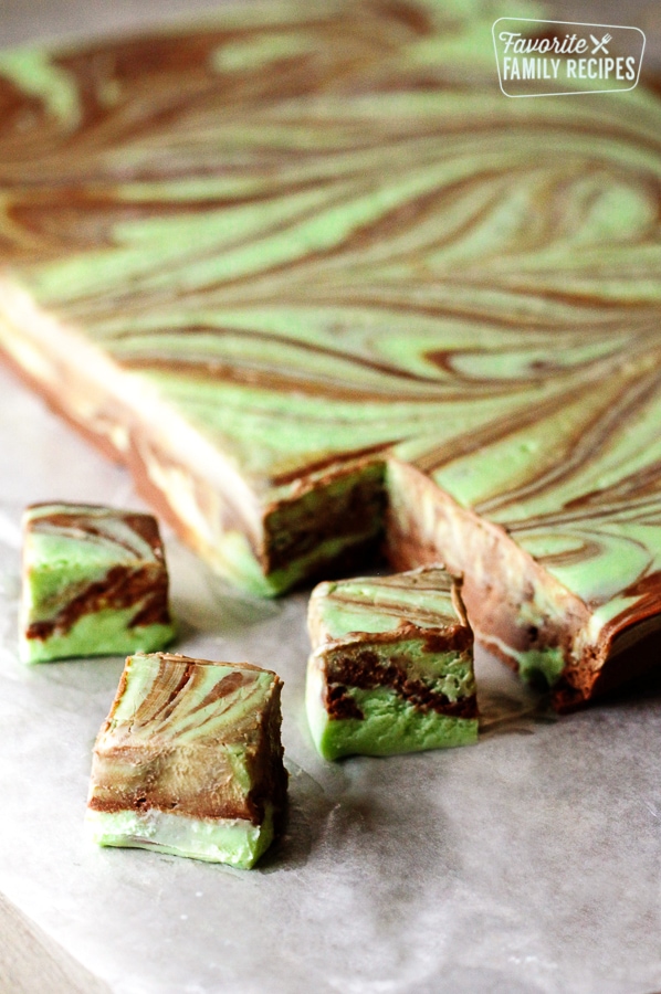 Mint Chocolate Fudge Swirl slab with 3 pieces cut out.