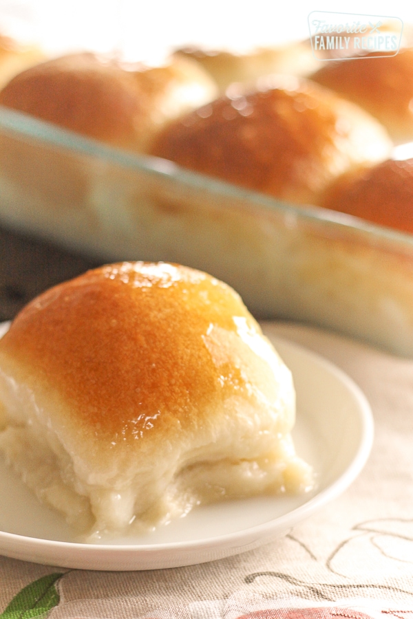 Pani Popo in a pan with a single slice on a plate.