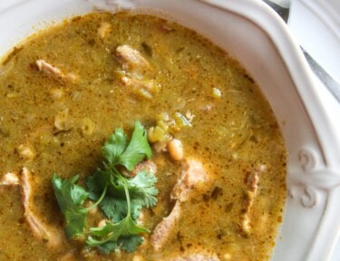 This Pork Chile Verde combines authentic Mexican flavors with tender pork in a spicy green sauce that will knock your socks off!