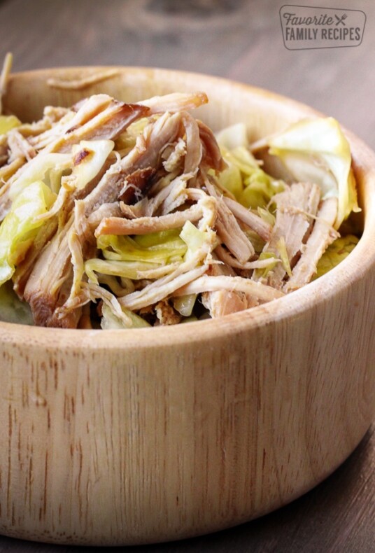 Kalua pork with cabbage in a wooden bowl