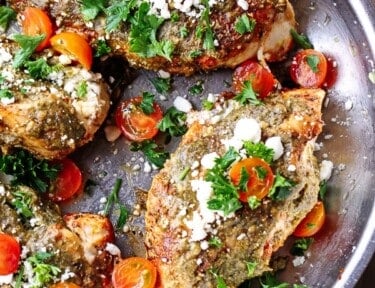 Stuffed Pesto Chicken in a frying pan