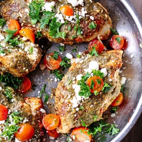Stuffed Pesto Chicken in a frying pan