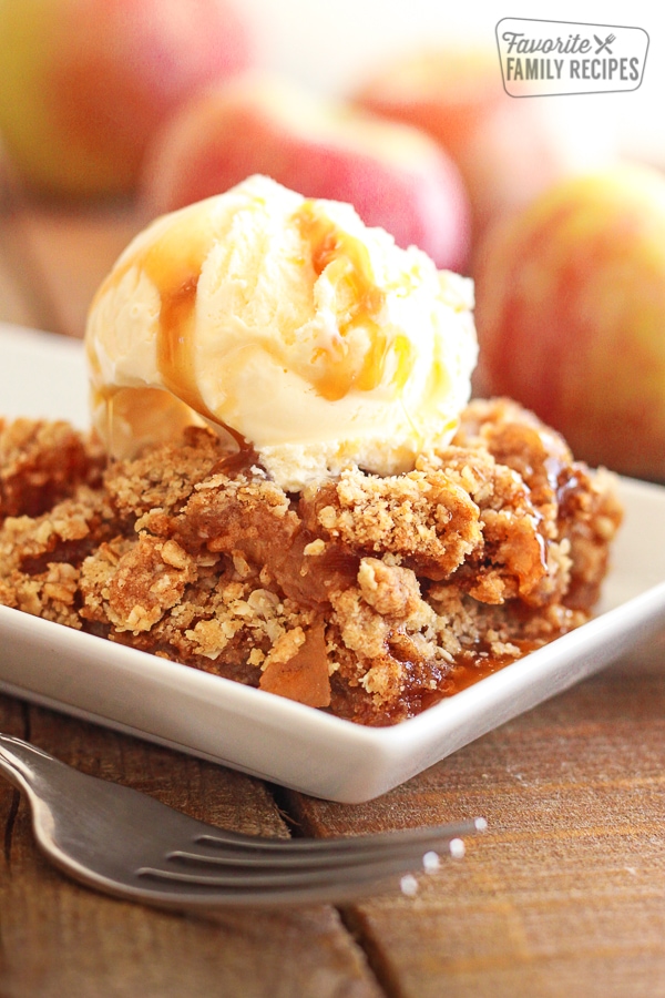 Traditional Apple Crisp with Ice Cream and Caramel Drizzle.