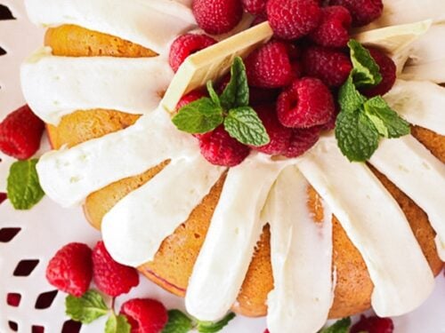 Above view of Nothing Bundt Cakes White Chocolate Raspberry Cake on a white platter.