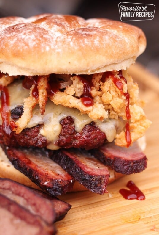 Blue cheese smoked brisket burger on a wooden surface