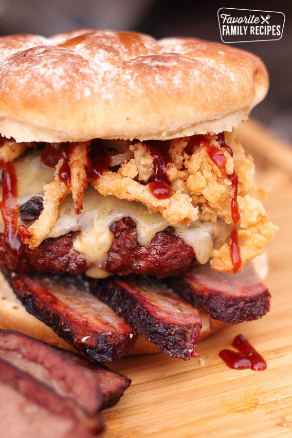 Blue cheese smoked brisket burger on a wooden surface