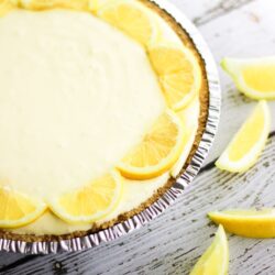 Creamy Lemon Pie surrounded by lemon slices