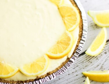 Creamy Lemon Pie surrounded by lemon slices