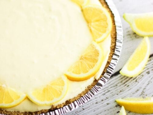 Creamy Lemon Pie surrounded by lemon slices