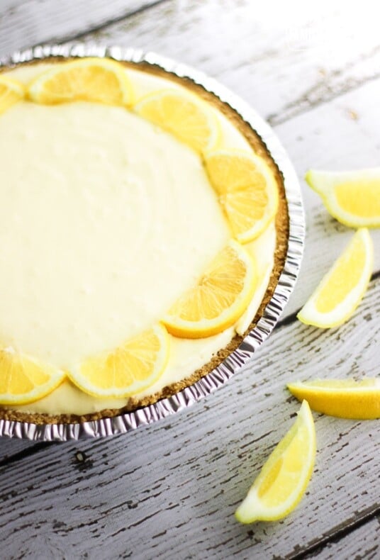 Creamy Lemon Pie surrounded by lemon slices