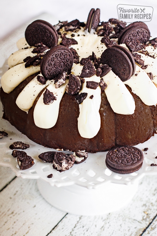 Double Chocolate Oreo Bundt Cake on a cake stand. 