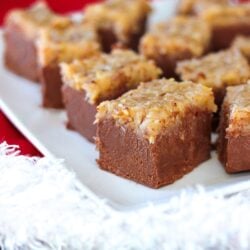 Pieces of German Chocolate Fudge on a Christmas tablecloth
