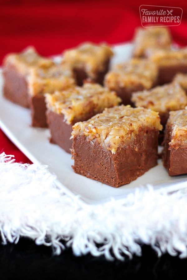Pieces of German Chocolate Fudge on a Christmas tablecloth