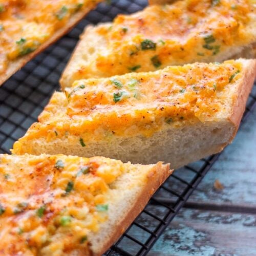 Hot Cheese Bread Slices on a cooling rack.