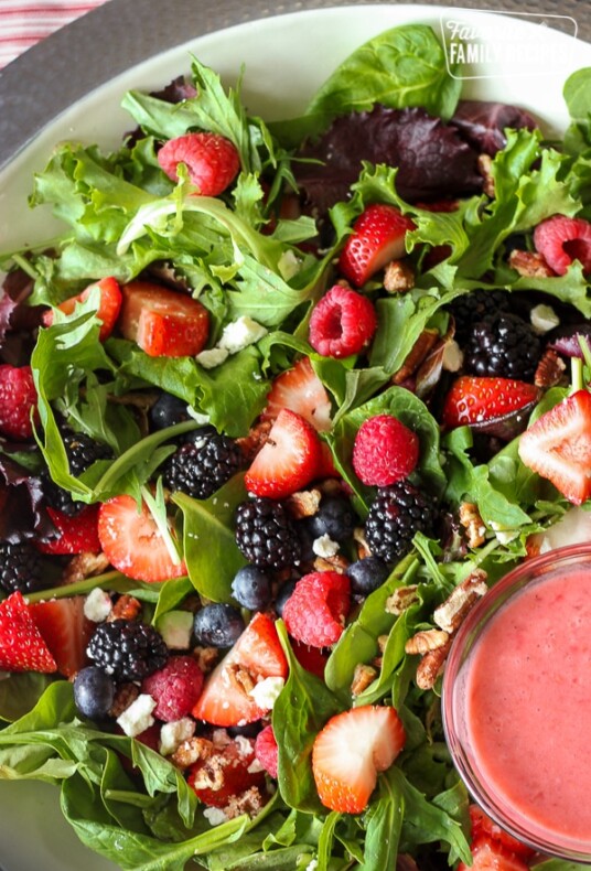Nuts About Berries Salad with dressing on the side.