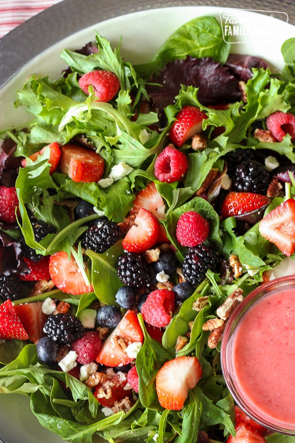 Nuts About Berries Salad with dressing on the side.