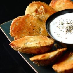 Parmesan Baked Potato Halves with a side of Sour Cream